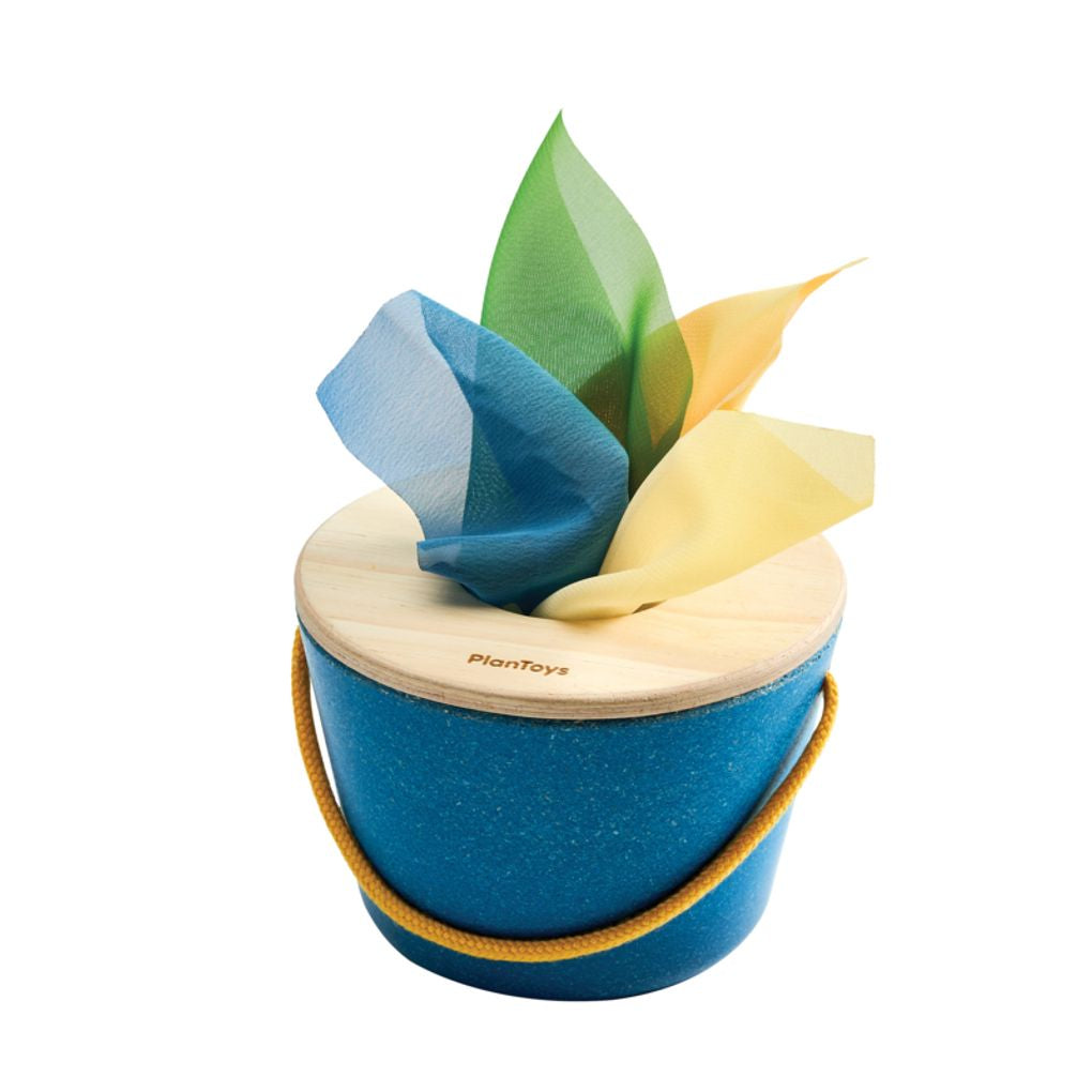 PlanToys blue wooden tissue bucket with a wooden lid and colorful chiffon tissues